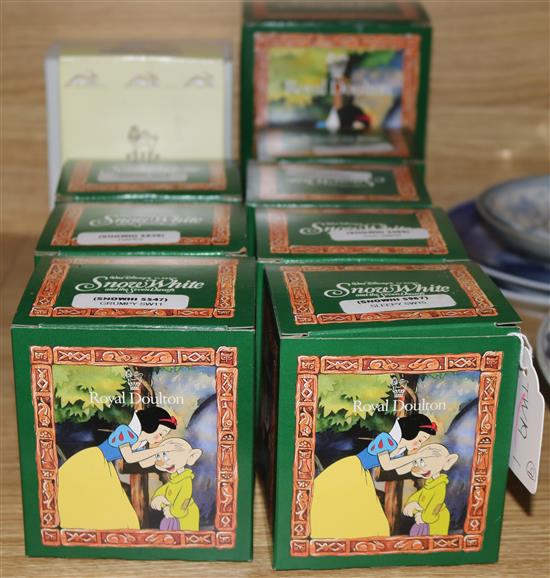 Royal Doulton Snow White and the Seven Dwarves, Bunnykins Aussie Surfer and Royal Albert Mr McGregor (all boxed)